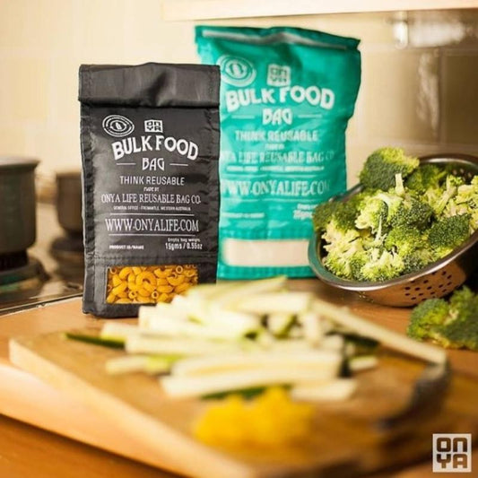 Onya bulk food bags holding dry food ingredients such as elbow macaroni pasta for making a nutritious meal. Available at Green Distributors.