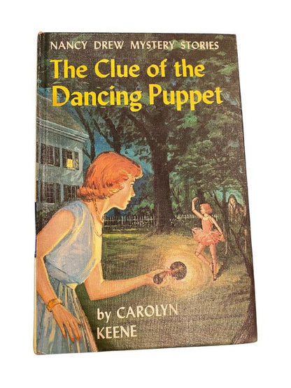 The Clue of the Dancing Puppet by Carolyn Keene