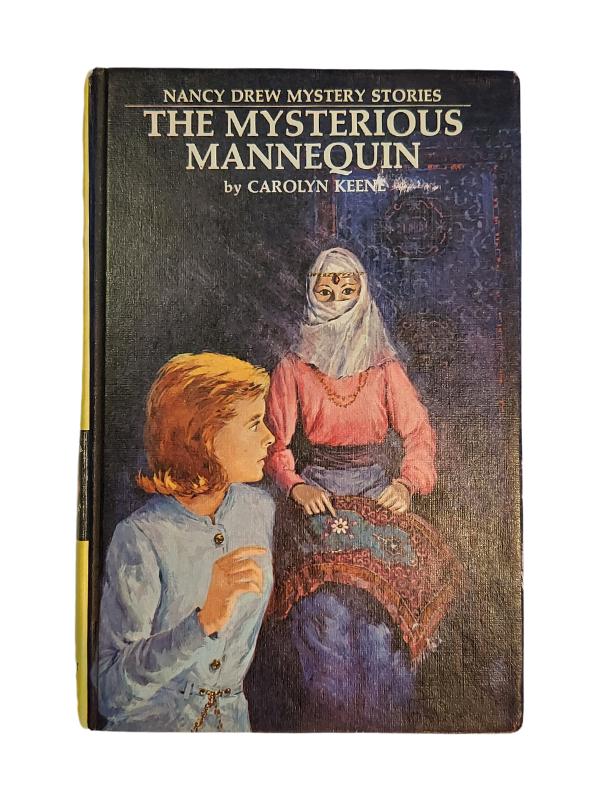 The Mysterious Mannequin by Carolyn Keene