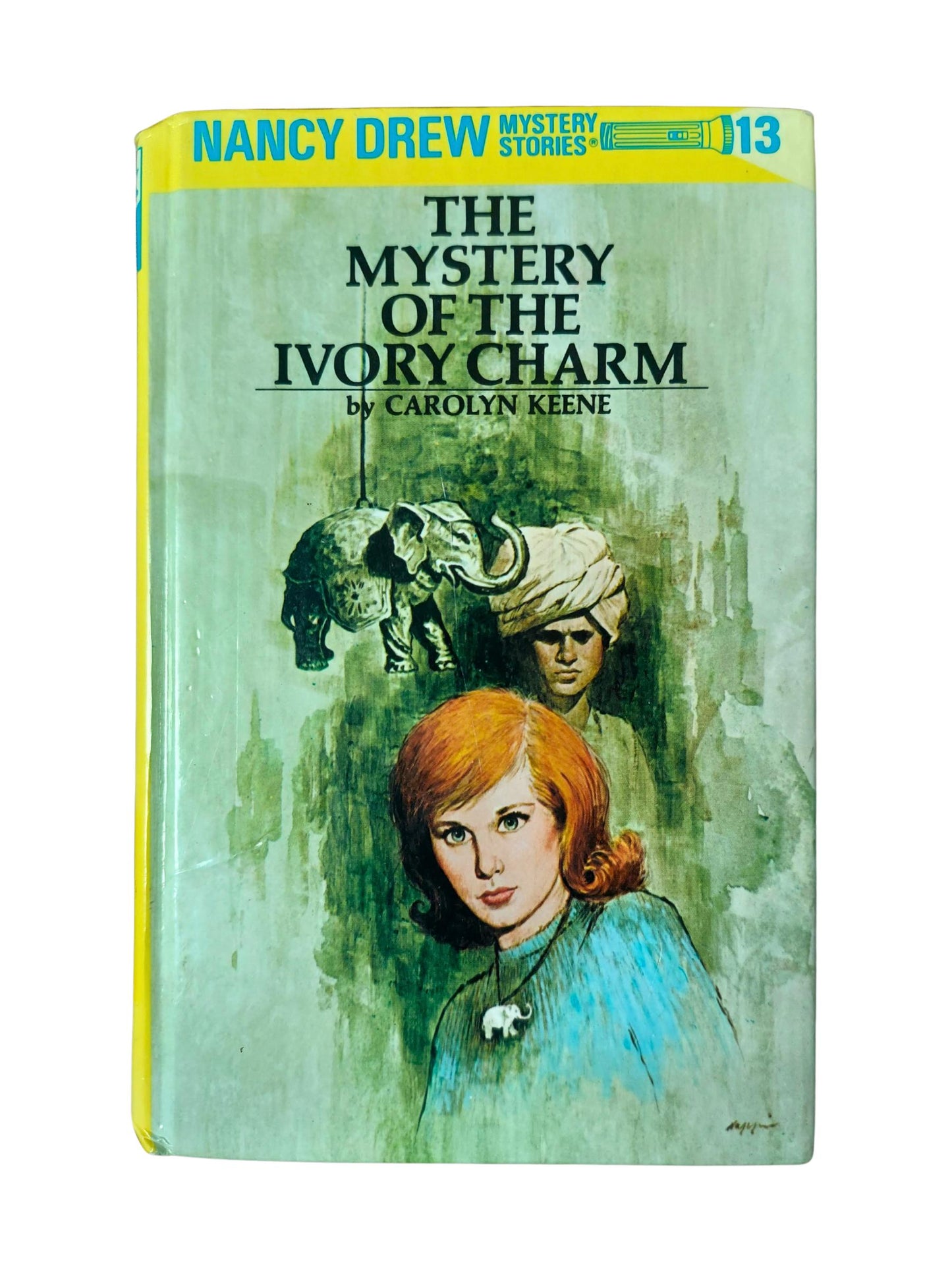 The Mystery of the Ivory Charm by Carolyn Keene