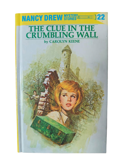 The Clue in the Crumbling Wall by Carolyn Keene