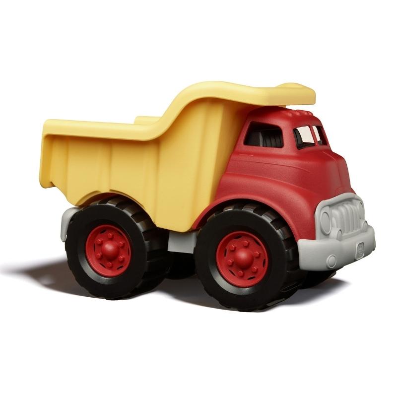 Green Toys Red Dump Truck with Yellow Dump Bucket facing to the right. Available at Green Distributors.