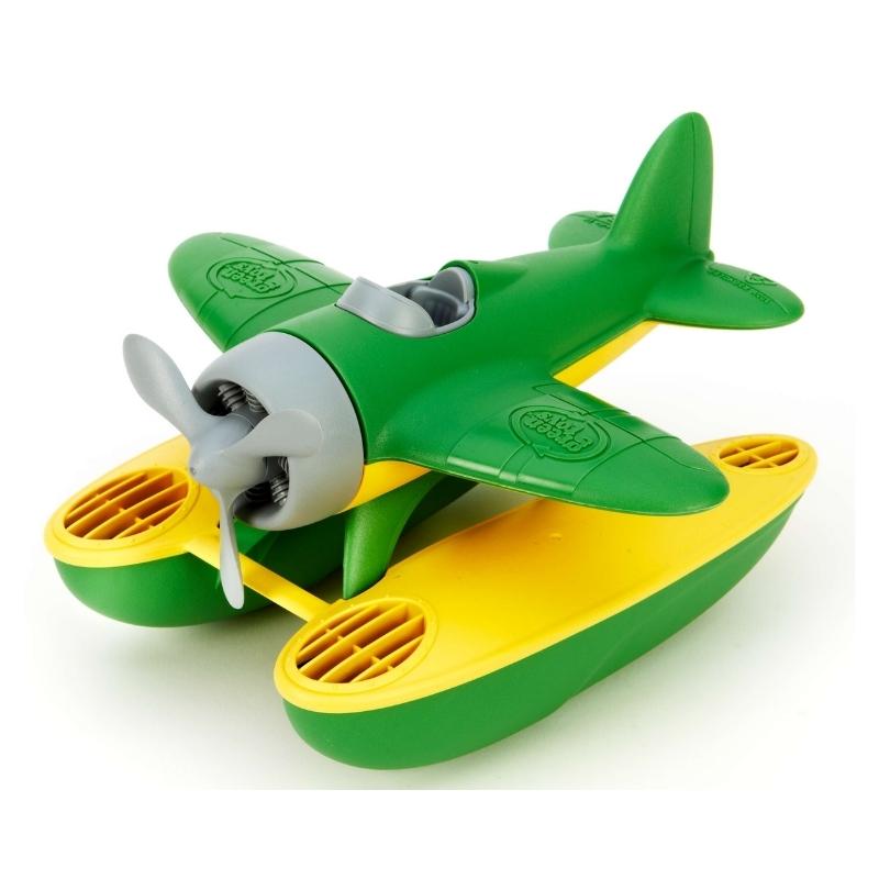 Green Toys seaplane with green wings, pontoon floats with yellow on top and green underneath, and gray propeller and cockpit facing to the left. Available at Green Distributors.