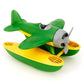 Green Toys seaplane with green wings, pontoon floats with yellow on top and green underneath, and gray propeller and cockpit facing to the right. Available at Green Distributors.