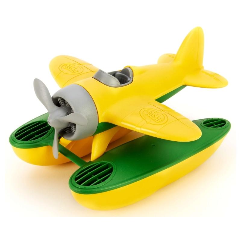 Green Toys seaplane with yellow wings, pontoon floats with green on top and yellow underneath, and gray propeller and cockpit facing to the left. Available at Green Distributors.