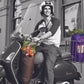 Man on a scooter comes back from doing his shopping. His purchases are being carried in 2 Onya reusable shopping bags in purple and brown. Available at Green Distributors.