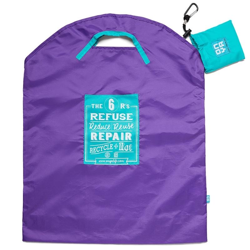 Large purple Onya reusable shopping bag with a light blue carry pouch and black carabiner. The patch on the bag is light blue and white displaying the 6 R's: Refuse, Reduce, Reuse, Repair, Recycle and Rot. Available at Green Distriutors.