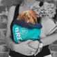 Woman holding an Aqua colored Reusable Artisan Bread Bag by Onya with a loaf of bread inside it.